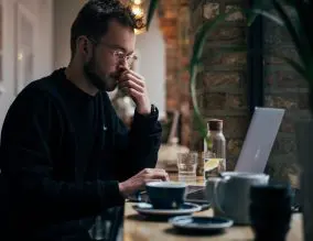 Business owner working at a computer