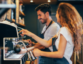 Baristas working in a cafe