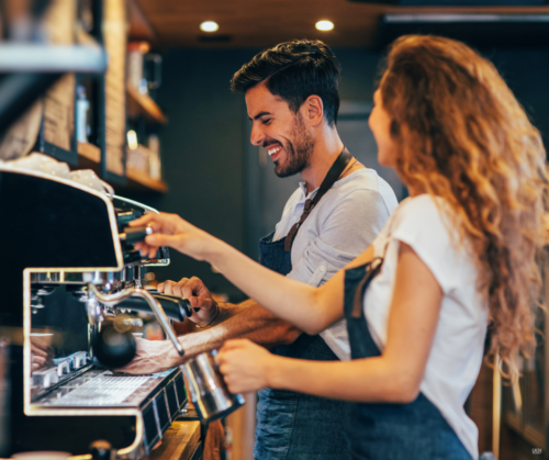 Baristas working in a cafe