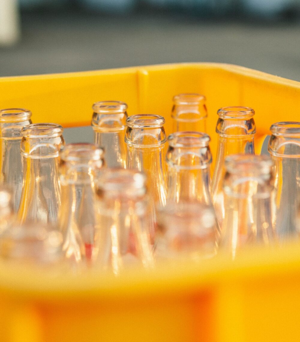 Glass bottles in container