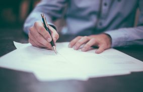 Man filling in forms
