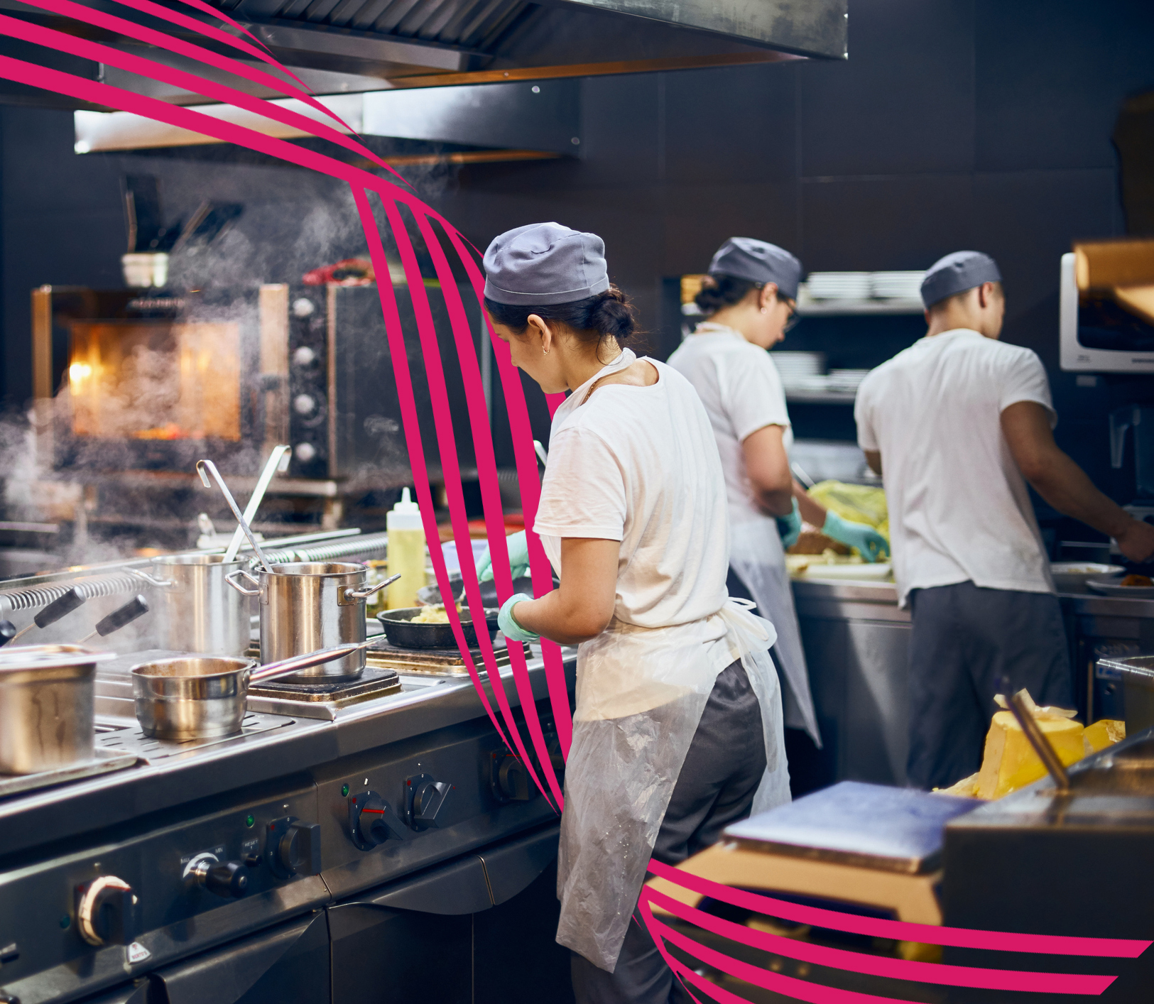 A team of cooks in a modern kitchen.