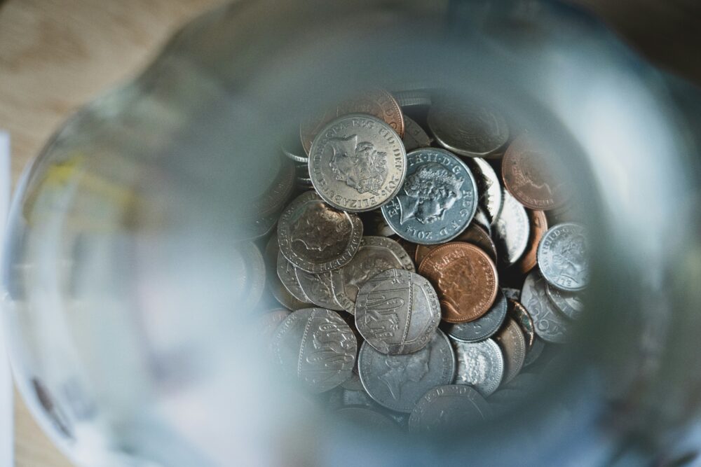Money and coins in a jar